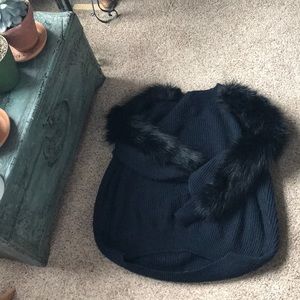 Navy Sweater with fur detail.